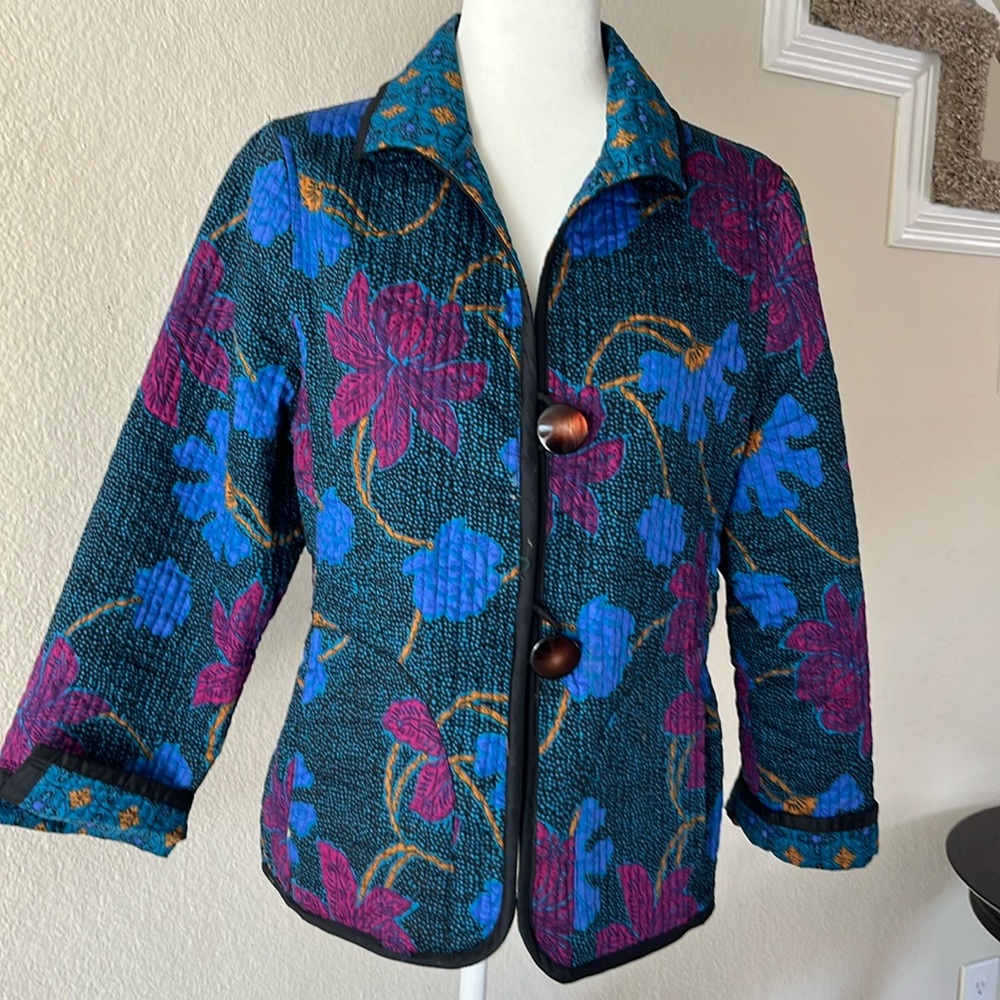 Quilted reversible jacket in size medium.  Beautifully made cotton/flower design